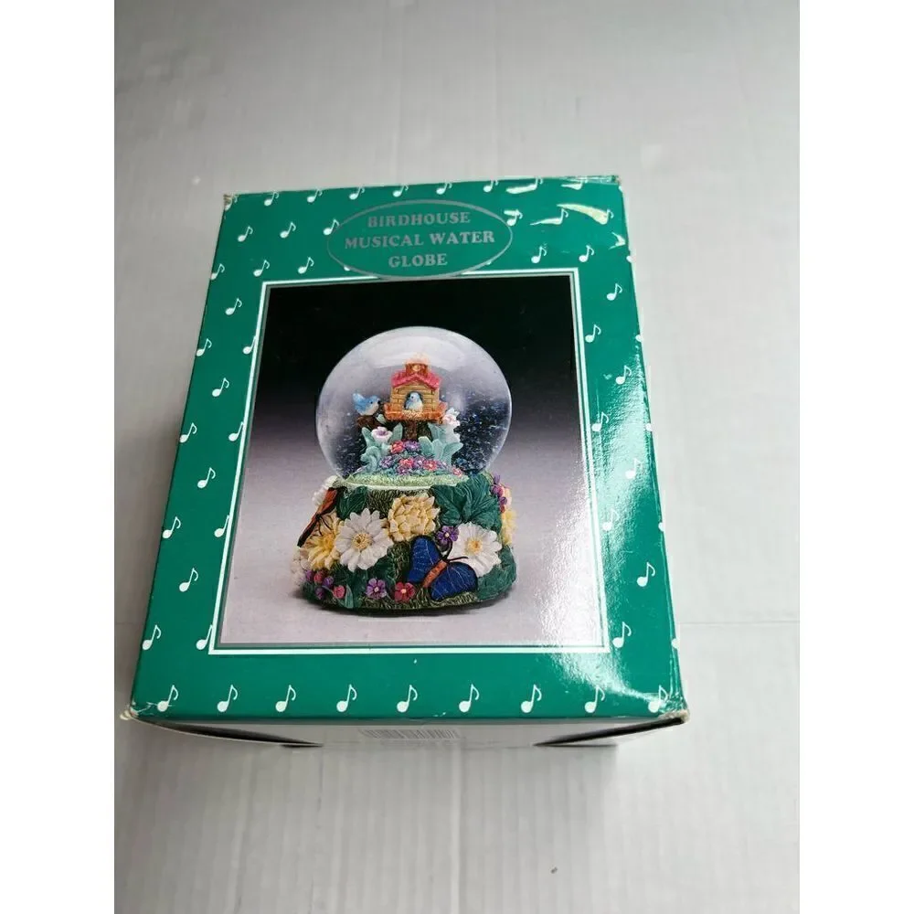 Vintage birdhouse musical water globe